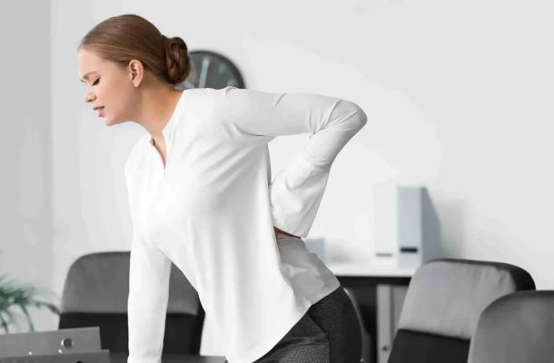 Lower Back Pain, Office Worker in need of therapeutic pain relief - Top Thai Massage Houston