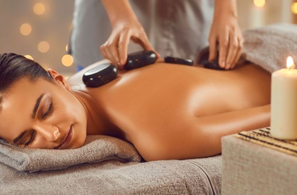 A woman getting a Houston hot stone therapy massage